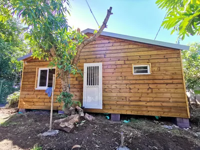Chalet bois 40m² avec terrasse de 18m² – Confort et élégance tropicale